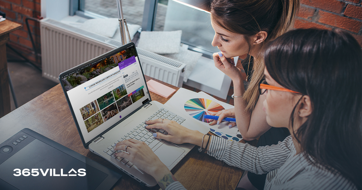 Two women sitting at a computer, enthusiastically choosing the perfect vacation rental website template
